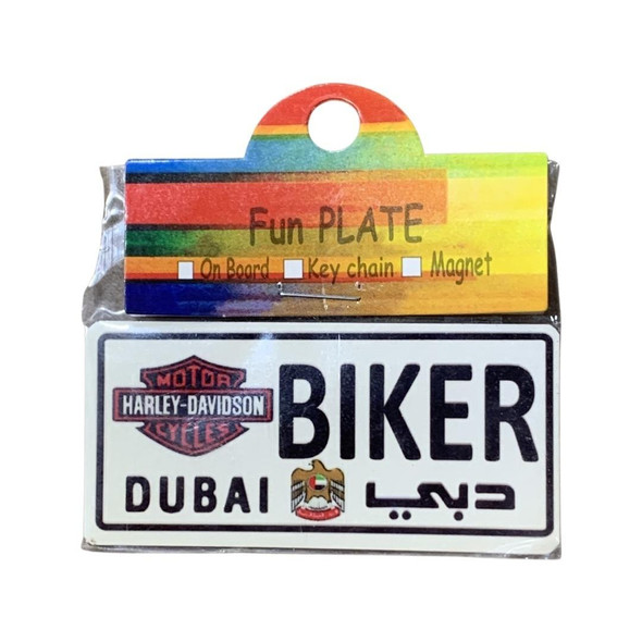 A professional product shot of the packaged novelty licence plate fridge magnet set against a neutral background.