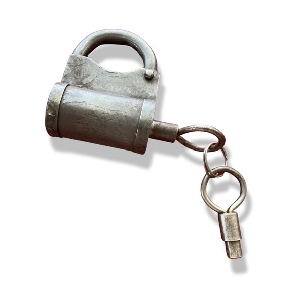 A handcrafted vintage metal lock with a cylindrical iron body and an authentic old-style iron key.