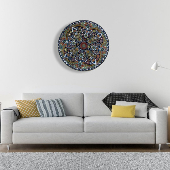 A premium 25 cm handmade pottery plate featuring vibrant hand-painted floral patterns and a high-gloss protective glaze for wall decor.