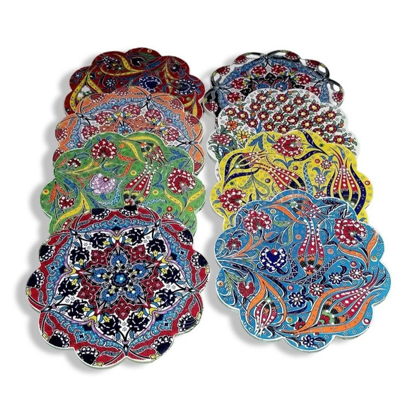 Vibrant ceramic coasters with detailed floral and geometric designs, perfect for adding a touch of Turkish artistry to any home.