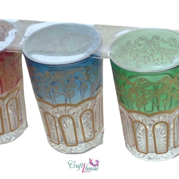 A set of 6 traditional Moroccan tea glasses arranged beautifully on a luxury server as a decorative heritage table centerpiece.