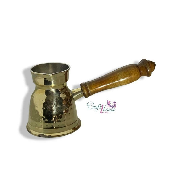 Close-up of the hand-etched traditional patterns on the body of the 3.5-inch miniature brass coffee pot.