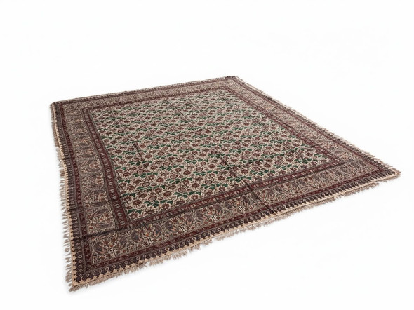 A professional presentation shot of the large artisan tapestry cotton table cloth and Ghalamkari bedsheet displayed against a clean background.