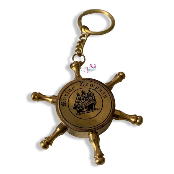 An exclusive Craftihouse vintage ship wheel compass keychain designed to bring maritime heritage, exploration spirit, and rustic elegance to everyday carry accessories.