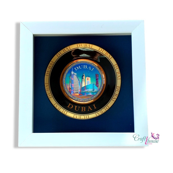 A sophisticated, framed collectible item featuring iconic landmarks of Dubai.