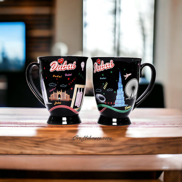Front exhibition view of the premium Dubai souvenir mug set, showcasing the two beautifully detailed ceramic mugs nested inside an elegant presentation gift box.