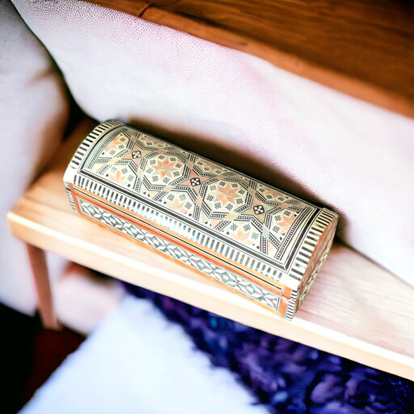 A professional product shot of the 23x8cm mosaic inlay wooden box resting on a textured tabletop setting.
