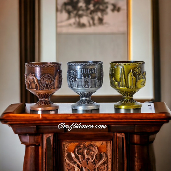 An exclusive Craftihouse unique souvenir gift in the UAE showcasing a traditional metal miniature shot glass set.