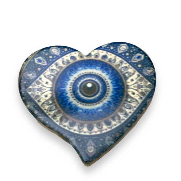 A premium 7 cm ceramic Blue Eye fridge magnet from Craftihouse, blending cultural protection with daily utility.