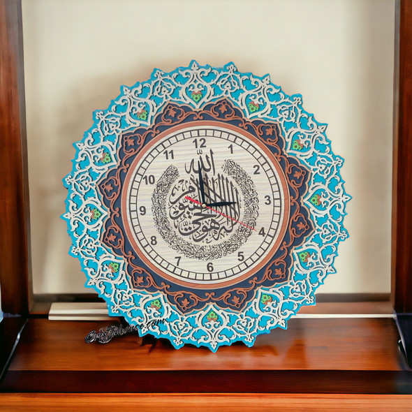 A premium 47 cm hand-carved wooden wall clock titled "The Celestial Guard" featuring Ayat al-Kursi in high-relief calligraphy.