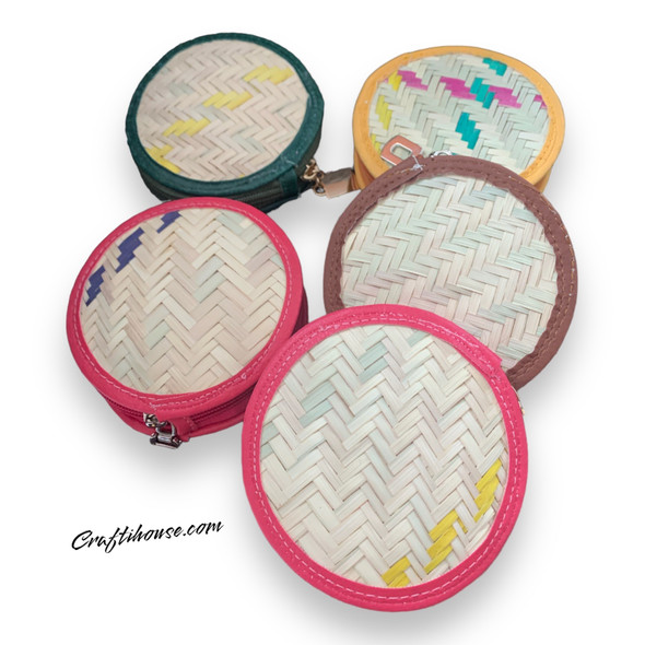 A group of 11 cm round rattan purses in assorted vibrant colors, showcasing the hand-woven texture and variety.