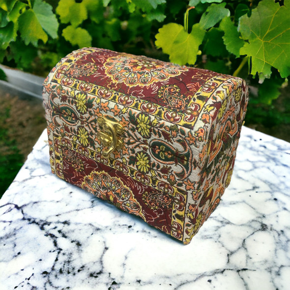 An exclusive Craftihouse decorative storage chest showcasing authentic Persian Termeh textile artistry.