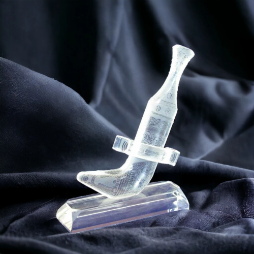 Collection of Glass Omani Khanjars and Jambeyas, authentic heritage souvenirs from Abu Dhabi and Dubai.