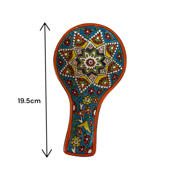 Close-up of the hand-painted 3D enamel textures and the intricate botanical motifs on the high-gloss ceramic spoon rest.