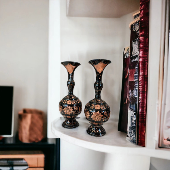 Close-up of the detailed hand-engraved botanical patterns on the body of the 25 cm luxury copper vase.