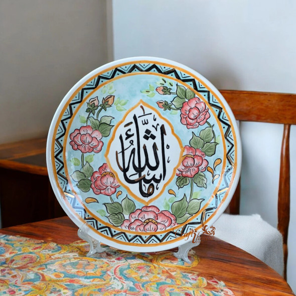 A professional product presentation of the exclusive decorative ceramic plate with Mashallah calligraphy from a premier UAE gift shop.