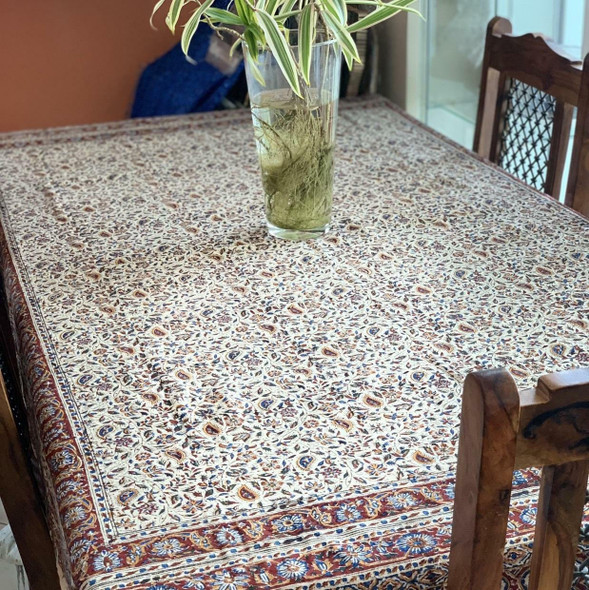 A premium 200x135 cm handmade Ghalamkari cotton cloth titled "The Imperial Vine" featuring intricate indigo and ochre block-printed floral patterns.