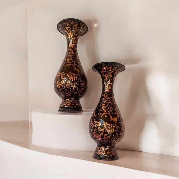 A set of 2 handcrafted 16 cm solid copper vases featuring hand-engraved bird and floral patterns on a dark-weathered finish.