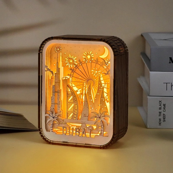 A wooden LED shadow box lamp featuring an illuminated silhouette of the Dubai skyline, including the Burj Khalifa and Burj Al Arab.