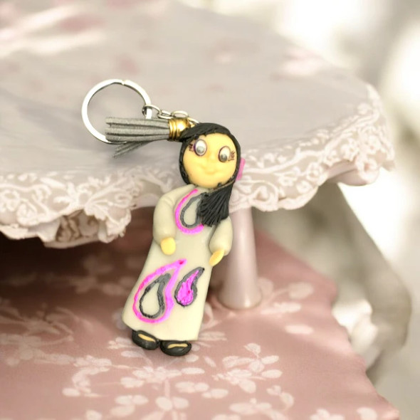Handmade Doll Keychain | Elegant Gray Abaya with Pink Accents & Tassel Charm | Qatar Souvenir - Handcrafted Heritage Souvenir from Craftihouse Dubai