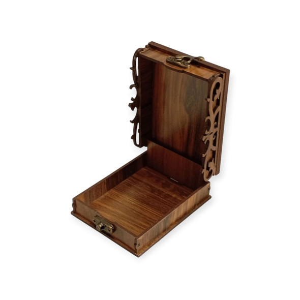 Side perspective of the 10x8 cm commemorative treasure chest, emphasizing the intricate geometric open-work patterns carved into the wood panels and the sturdy joint construction.