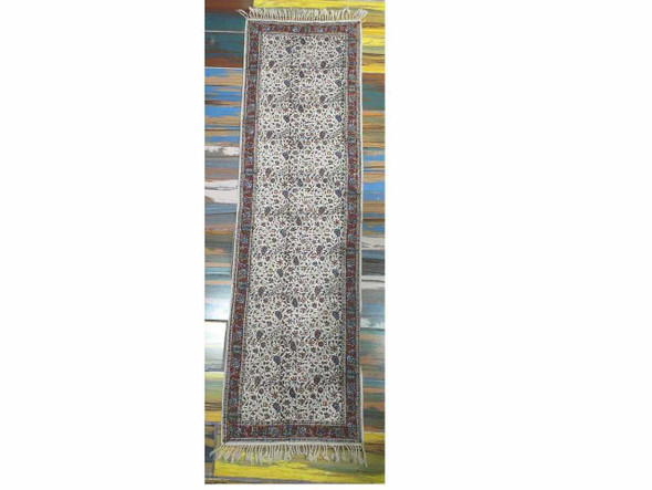 A sophisticated, handcrafted Ghalamkari cotton runner that serves as a beautiful accent for dining tables or decorative wall displays.