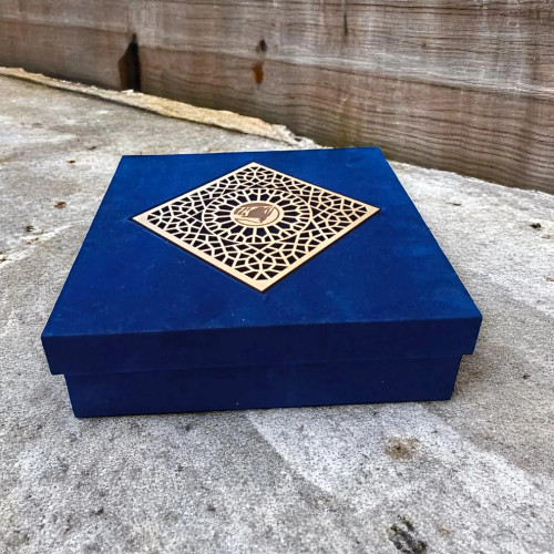 Close-up of the 20cm copper vase highlighting the intricate turquoise and cobalt blue hand-painted floral Minakari patterns.