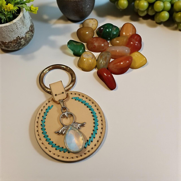 Luxury Handmade Leather Keychain With Metal Angel Artisan Detail Shot