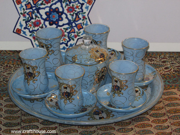 A premium 8-piece Qajar style decorative tea set featuring a hand-painted tray, sugar bowl, and 6 tea glasses with traditional portraits.