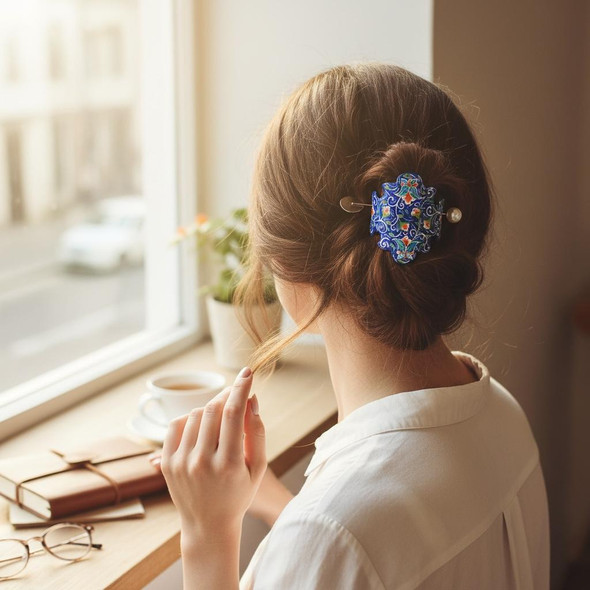 An elegantly designed hair clip showcasing traditional Middle Eastern enamel techniques.