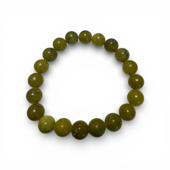 A circular stretch bracelet featuring polished round stone beads in a unique olive-mustard yellow-green hue.