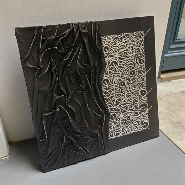 A 100x100 cm square original calligraphy canvas featuring a draped black textured side and silver Persian script on a black background.