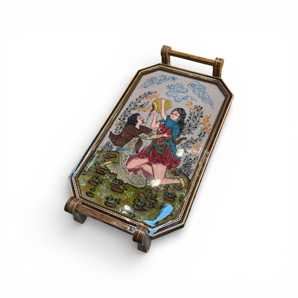 A perspective view of an octagonal 40x24 cm Khatamkari serving tray featuring a hand-painted Layla and Majnun miniature.