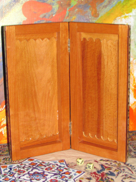 A side-profile view showing the precision hinges and the compact folding mechanism of the 30 cm traveller backgammon set.