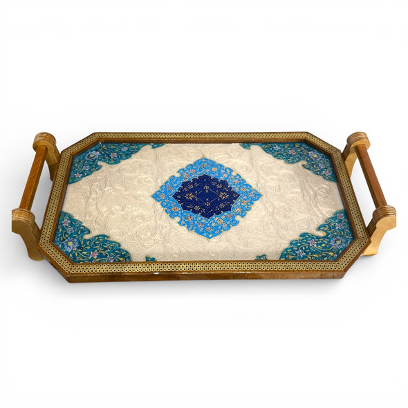 Close-up of the fine brushwork and detailed floral petals on a hand-painted yellow and red wooden magnet.