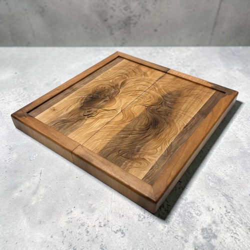 Close-up of the 3D embossed horse muscles and mane, highlighting the hand-carved wood craftsmanship of the game board.