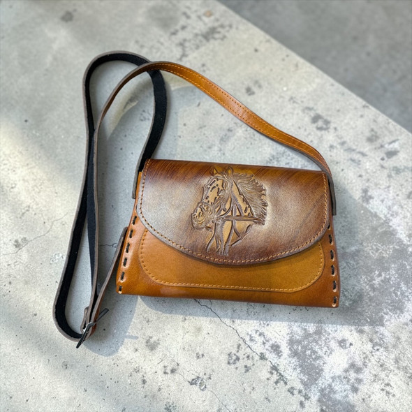 A 21x14 cm handmade natural leather journal cover with a rustic brown finish and hand-stitched edges.