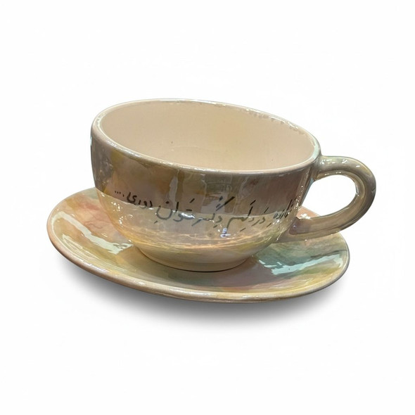 Close-up of the white calligraphy "نمانده در دلم دگر" against a swirling blue and dark green ceramic background.