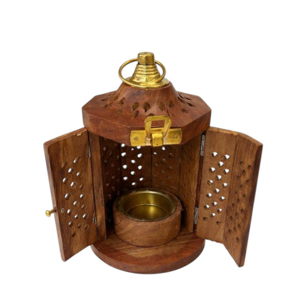 A handmade minimalist wooden lantern candle holder showcasing natural wood grain and a sleek tapered architectural shape.