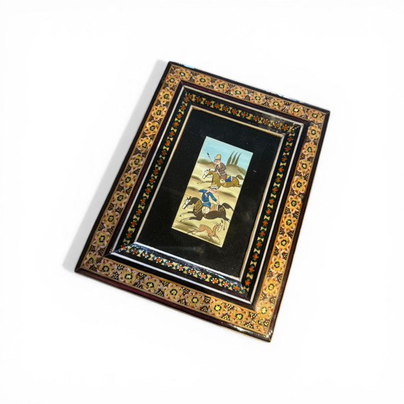 A detailed view of the hand-painted miniature scene on genuine camel bone, showcasing the fine brushwork and traditional motifs.