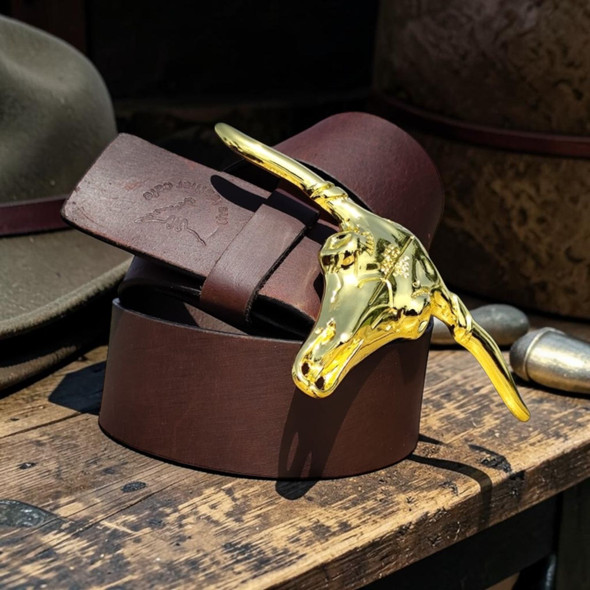 A premium handmade natural leather belt in a rich brown color featuring a polished silver-tone buckle.