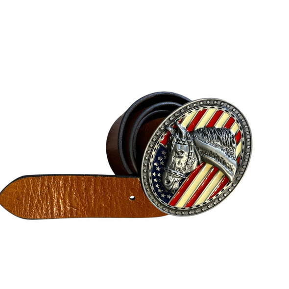 The handmade natural leather belt with a silver horse head buckle shown as a prestigious accessory for a professional rider.