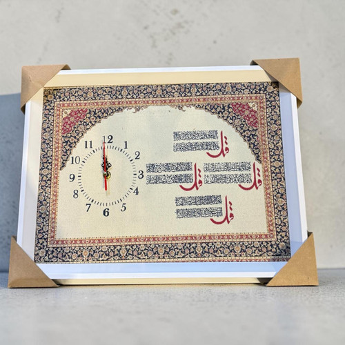A traditional style large 4 Qul framed clock in a white casing mounted gracefully as a decorative heritage anchor on a living room wall.