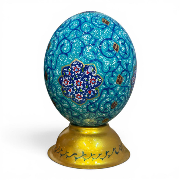 traditional Middle Eastern illumination art on a turquoise-hued ostrich egg