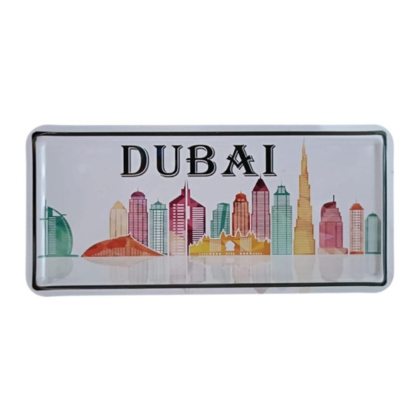 Close-up view of the metal magnet highlighting the geometric and abstract representation of Dubai’s iconic architecture.