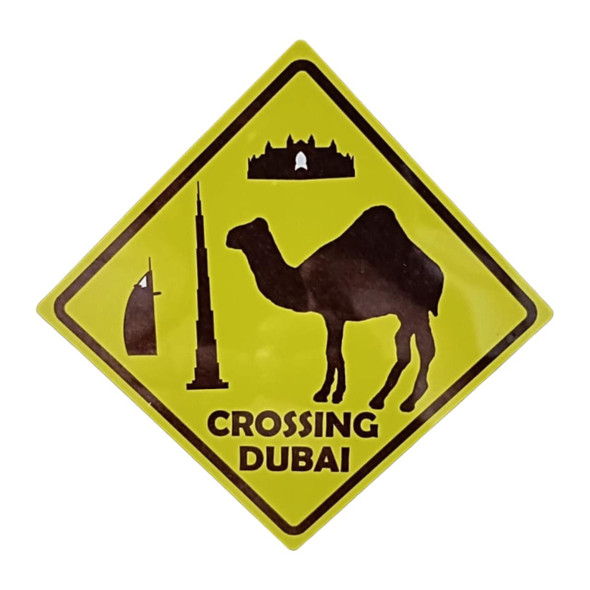 A durable yellow diamond-shaped aluminum magnet perfect for unique souvenir collections, featuring a camel crossing theme.