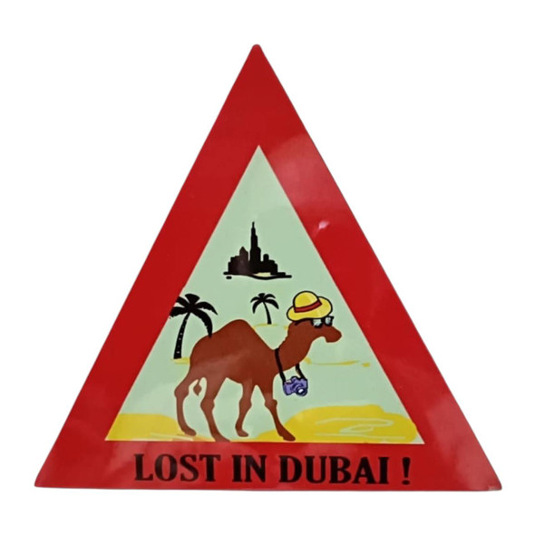 A durable triangular aluminum magnet that captures the lighthearted spirit of being "Lost in Dubai."