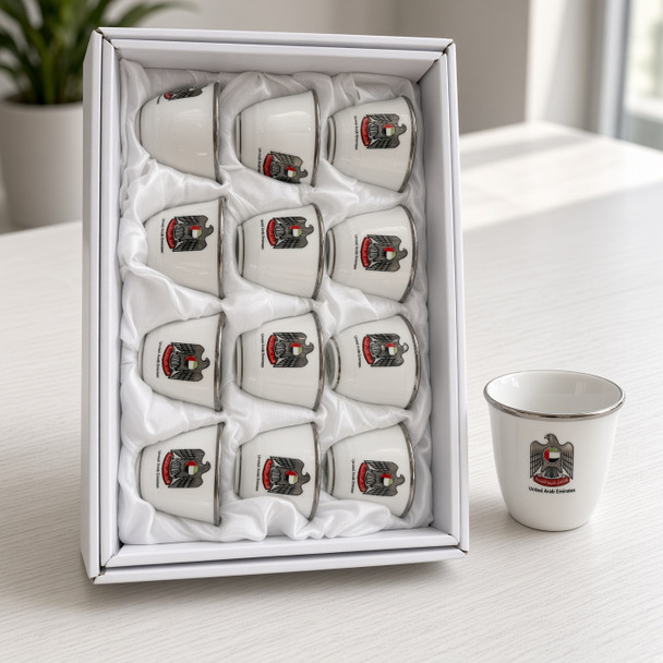An exclusive Craftihouse 12-piece UAE coat of arms Arabic coffee cup set designed for corporate gifting, National Day celebrations, and traditional Emirati hospitality.