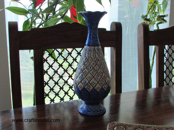 Three-quarter studio perspective capturing the refined contours, layered concentric design motifs, and heavy structural balance of the handcrafted 25 cm miniature art copper vase.