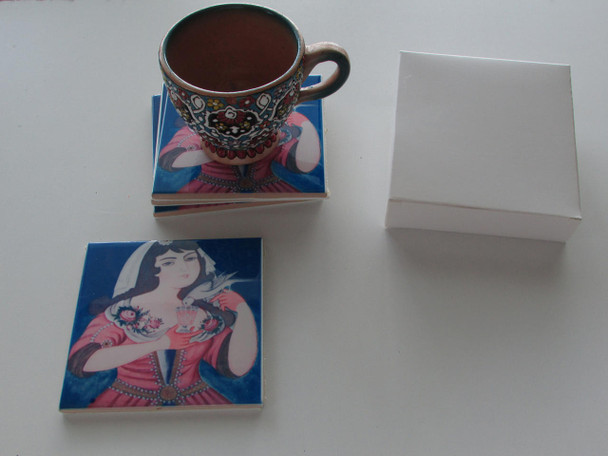 An artisan ceramic tea coaster set featuring a timeless portrait design, perfect for adding a touch of heritage and personality to any home decor setting.